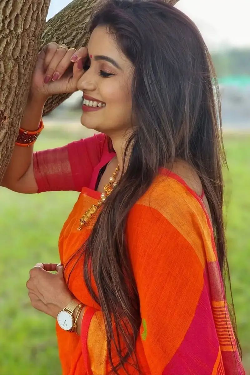 Tamil TV Actress Srithika Photos In Orange Saree Blouse